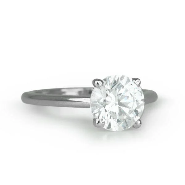 Unique Jewelry Designs Now At Discounted Rates Platinum Ring with Prong-Set Round Center Stone