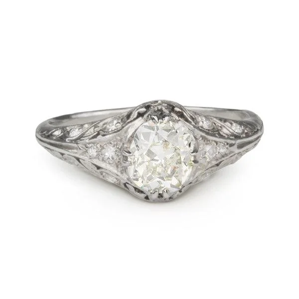 Elegant Jewelry Styles At Budget-Friendly Prices Vintage Platinum Ring with Oval Cushion-Cut Diamond