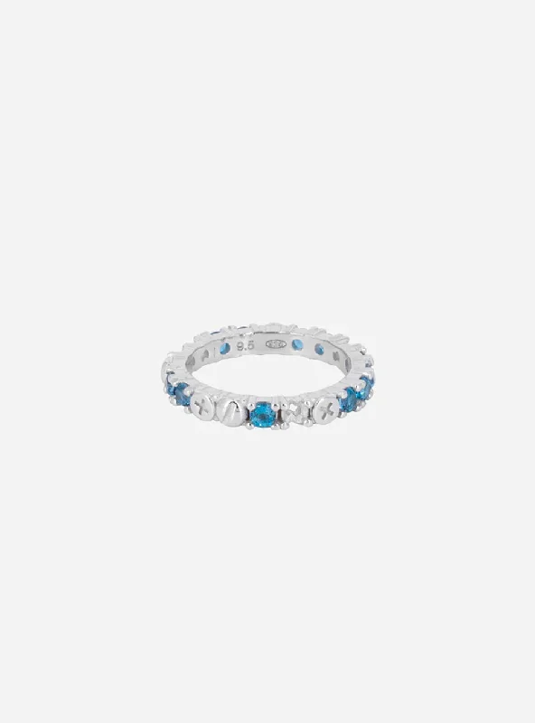 Timeless Jewelry Styles At Wallet-Friendly Prices Broken eternity ring with topaz