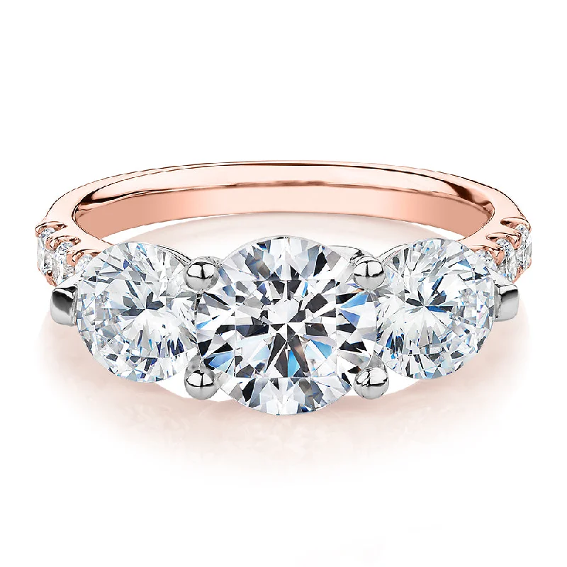 Limited-Stock Jewelry Sale – Shop Before It's Gone Three stone ring with 3.59 carats* of diamond simulants in 10 carat rose and white gold