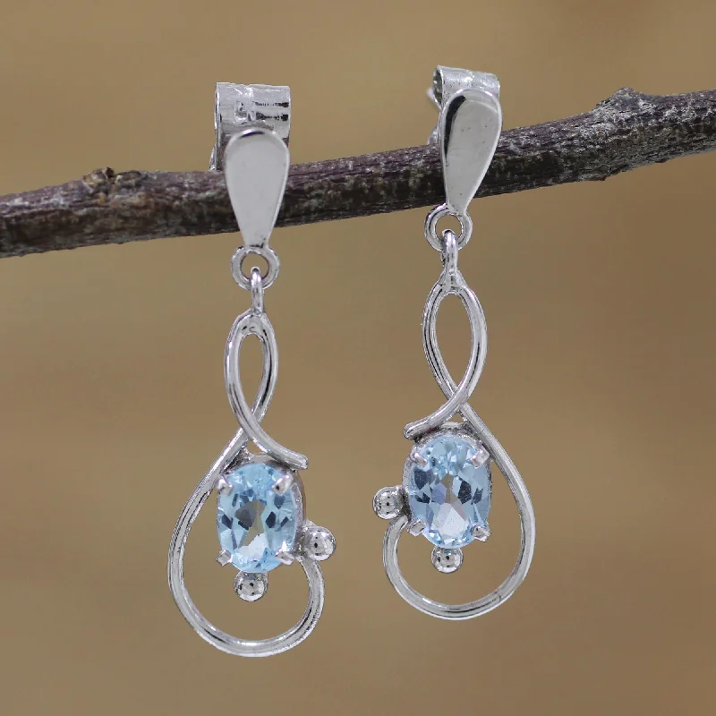 Luxury Jewelry Without The Luxury Price Tag Beauty Swirls Rhodium Plated Blue Topaz Dangle Earrings from India