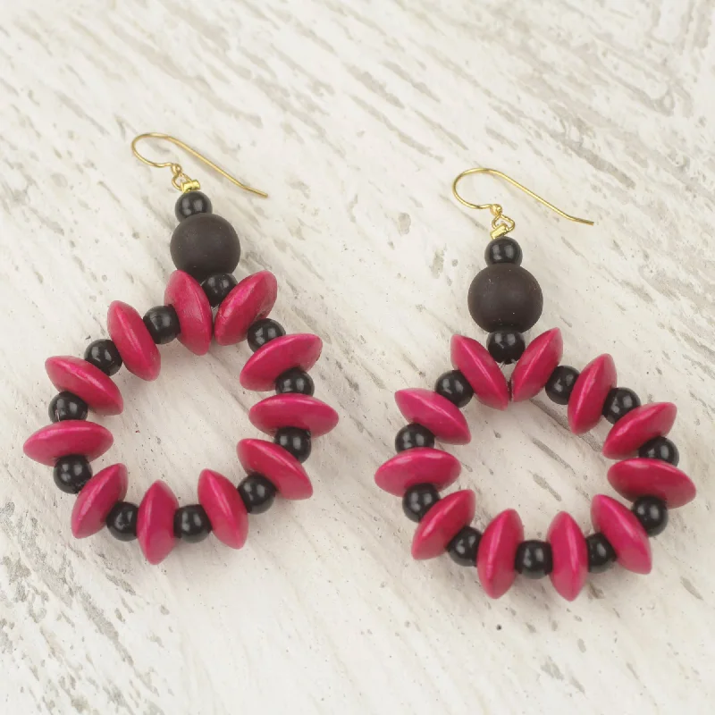 Elevate Your Outfit With Discounted Statement Jewelry Bloom in Magenta Hand Crafted Sese Wood Dangle Earrings from Ghana