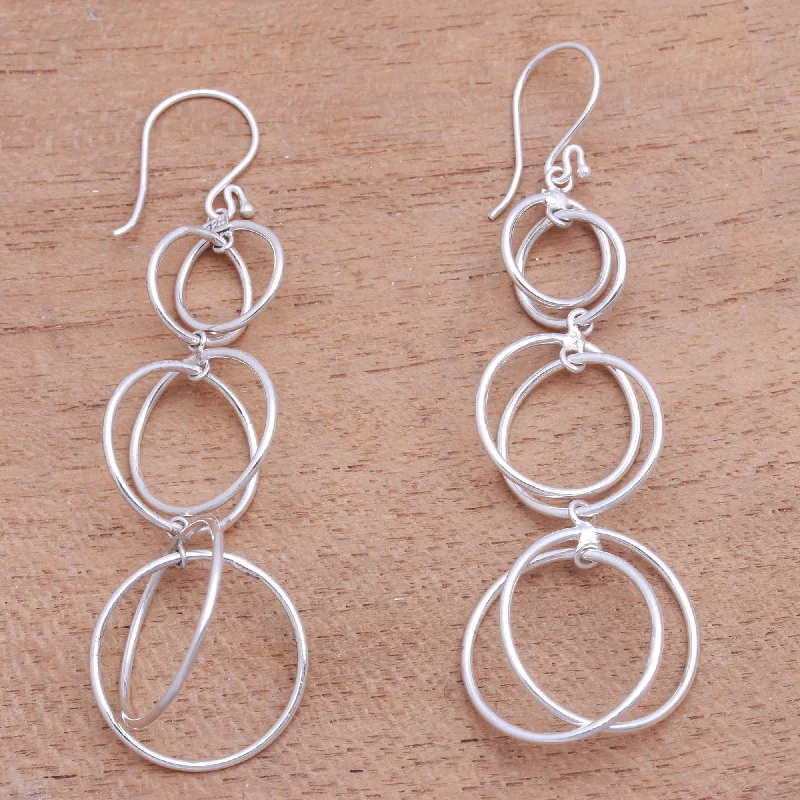 Shop Dazzling Jewelry At The Best Prices Interlocking Orbits Circular Sterling Silver Dangle Earrings from Bali