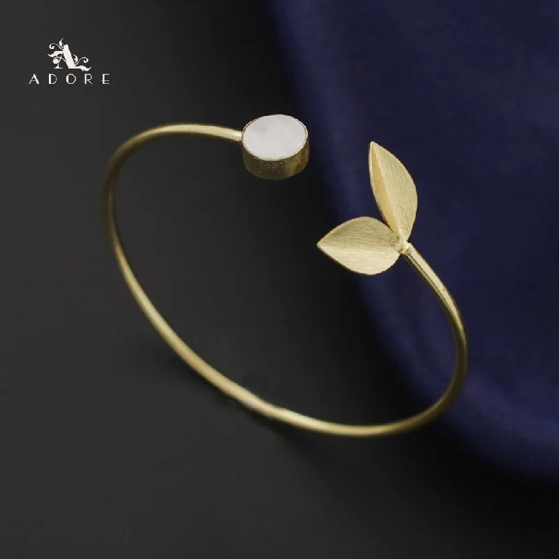 Jewelry Flash Sale – Stylish Designs At Unbeatable Rates Golden Round MOP Twin Leaf Bangle Jewelry Flash Sale – Stylish Designs At Unbeatable Rates Golden Round MOP Twin Leaf Bangle